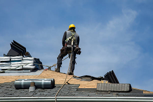 Professional Roofing technician working in Pleasant Valley, IA